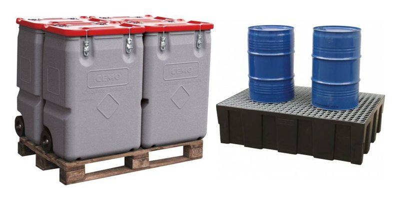 Gefahrgut-Transportboxen und Fässer auf einer Auffangwanne